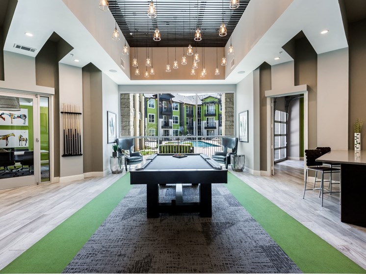 Game lounge with community kitchen and pool table